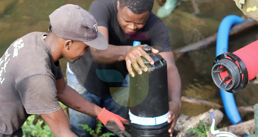 JOGOO after-sales technicians servicing an irrigation network